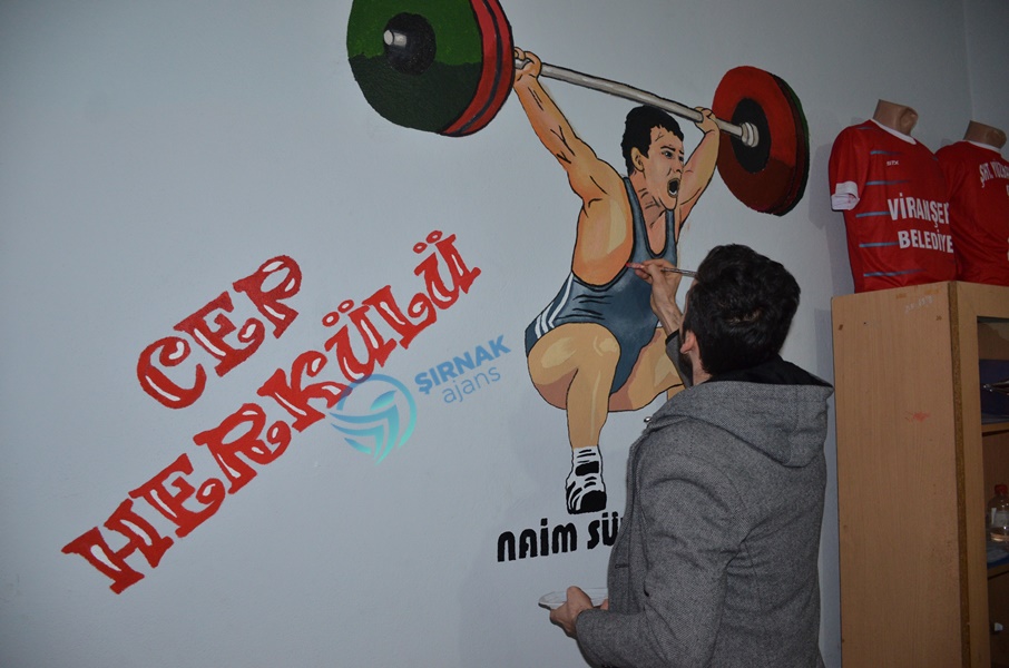 Milli sporcuların resimleri Şırnak duvarlarında